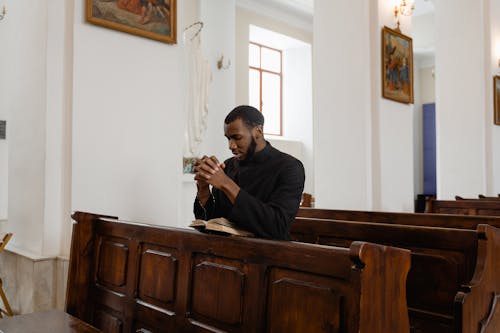 Photograph of a Priest Praying