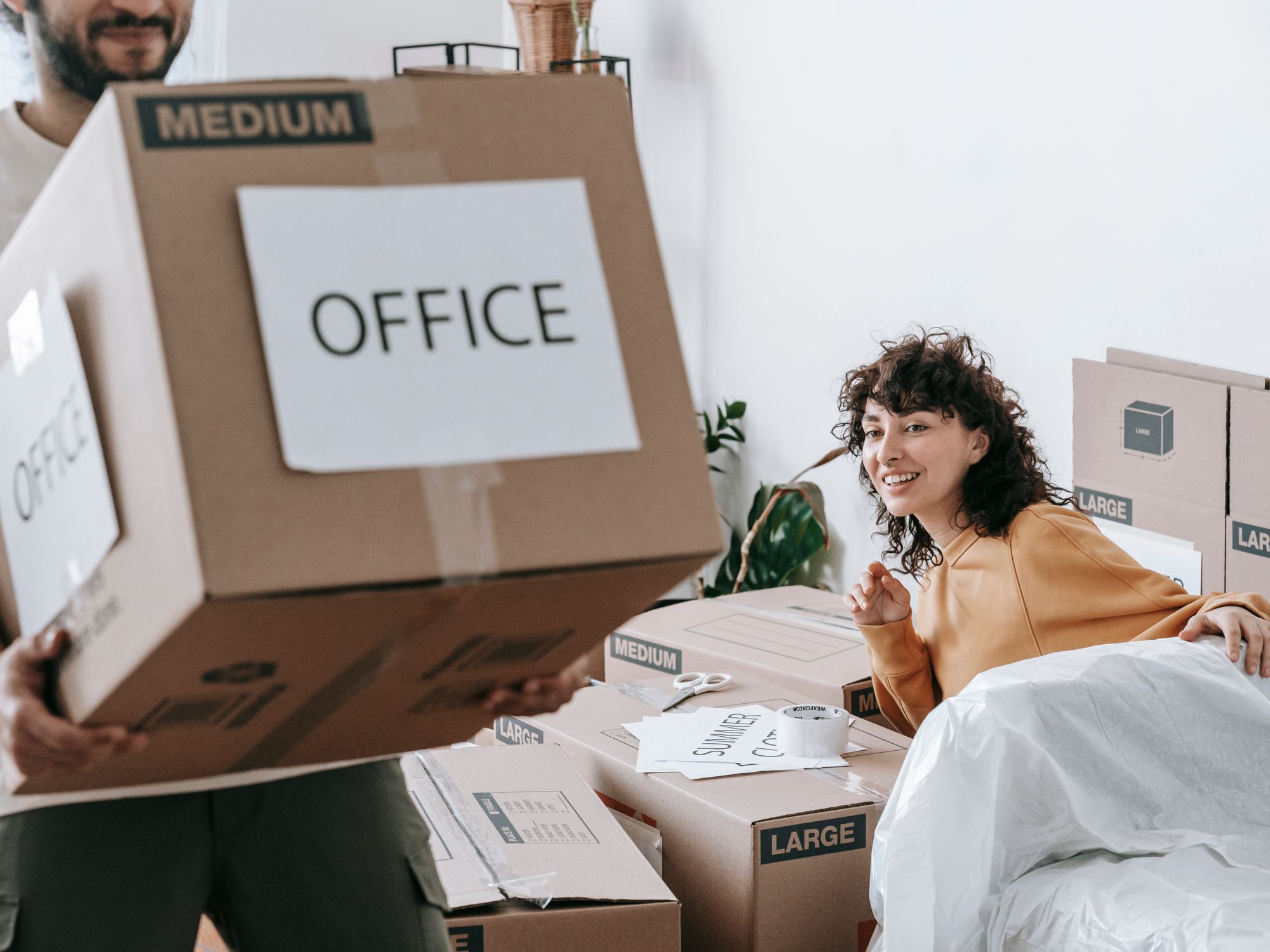 Flat Removals in Hayfield, East Midlands — movers carrying boxes for a flat move
