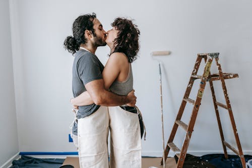 A Loving Couple Doing A Kiss