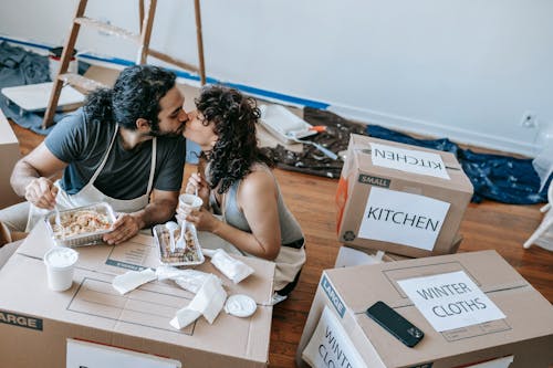 Couple Kissing While Eating 