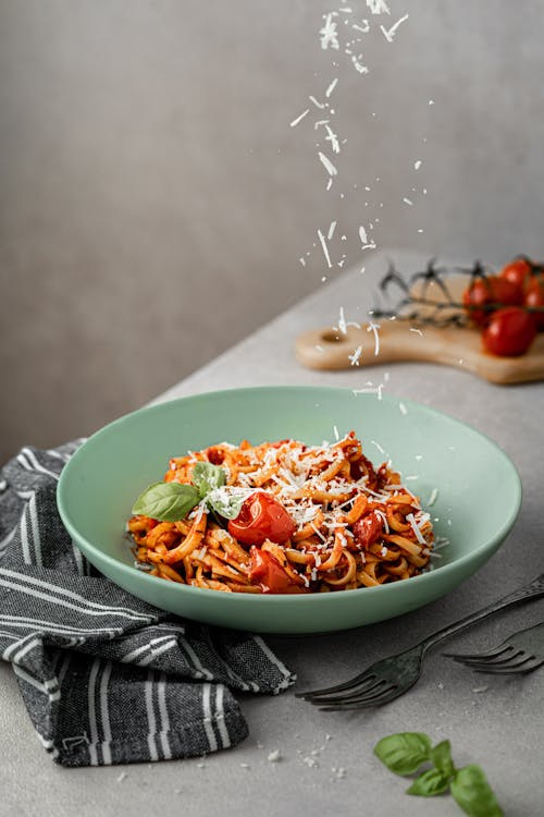 Free Delicious spaghetti with Bolognese sauce and Parmesan cheese Stock Photo
