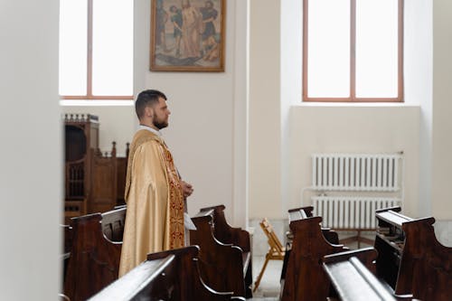 A Priest in Beige Vestment