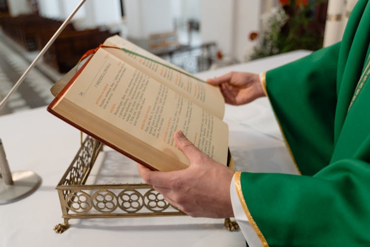 A Priest Reading A Book