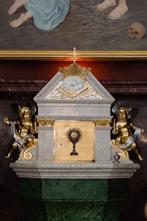 Free Close-up of an ornate marble altar showcasing religious sculptures and artifacts. Stock Photo