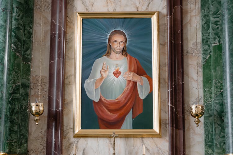 A Painting Of Jesus Christ Hanged On The Wall