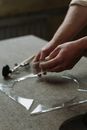 A Person Holding a Round Clear Glass