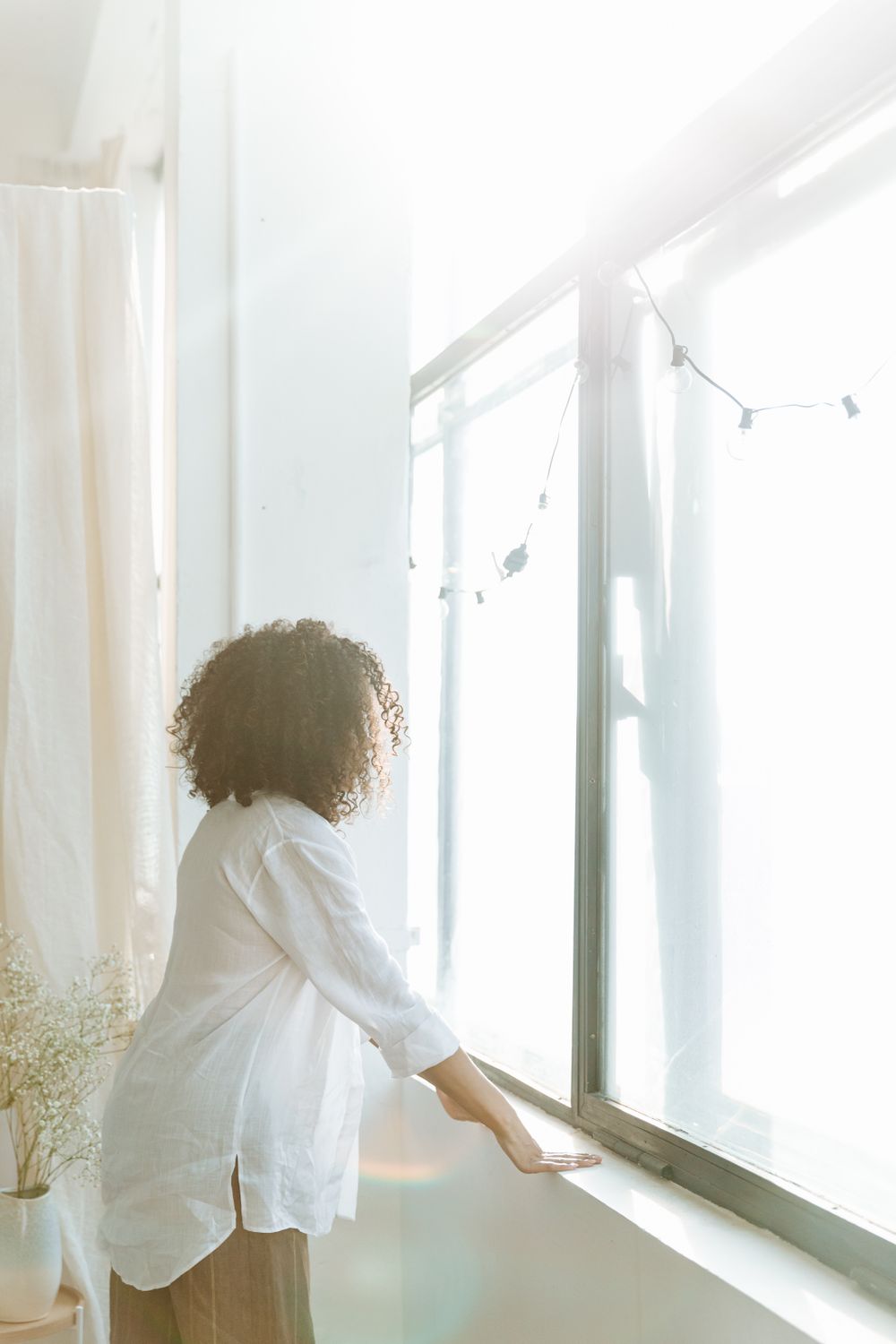 Woman Standing near Window · Free Stock Photo