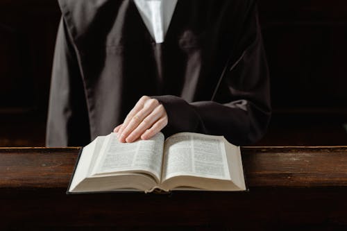 A Person Reading a Bible