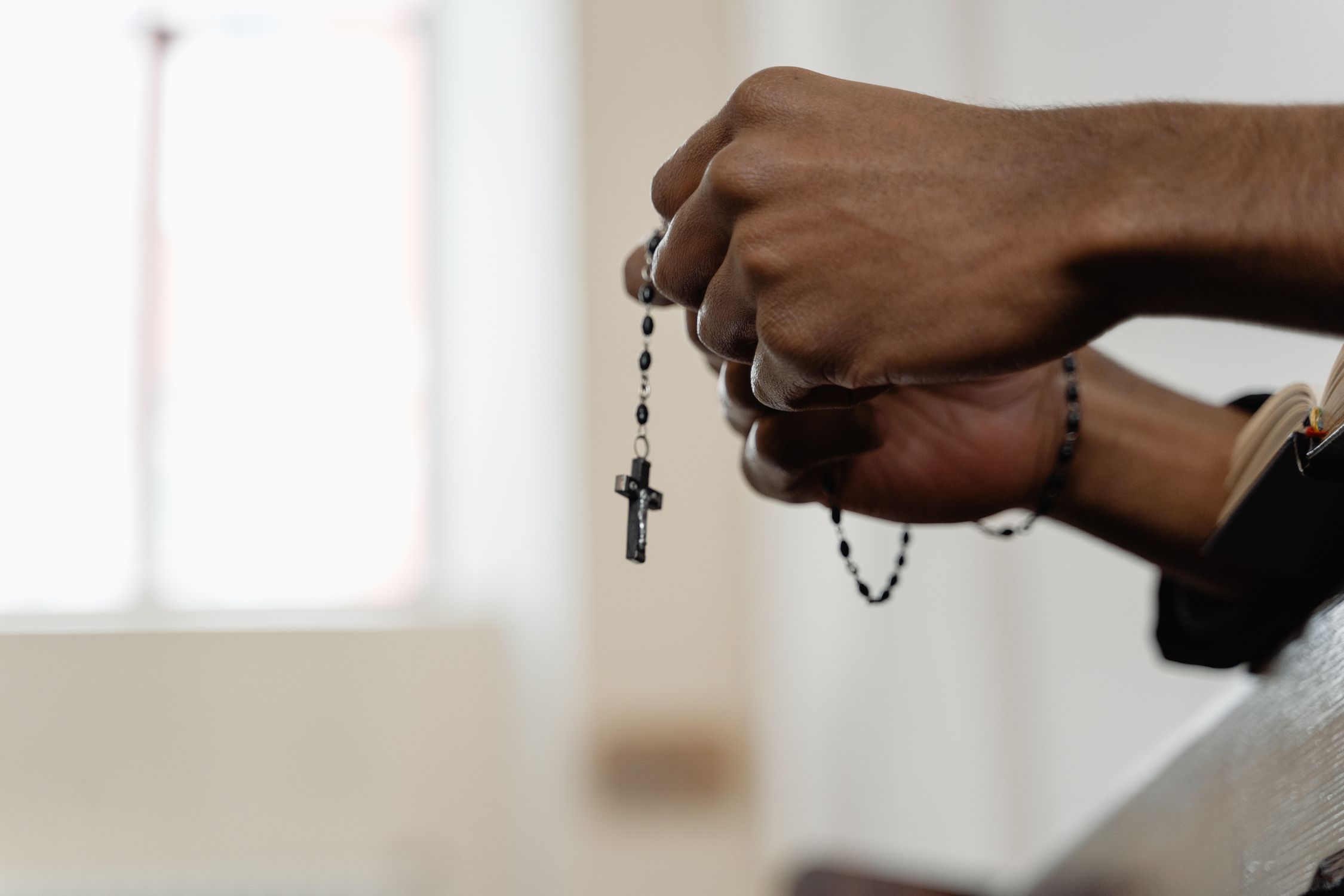Close-Up Shot of a Person Holding Prayer Beads · Free Stock Photo