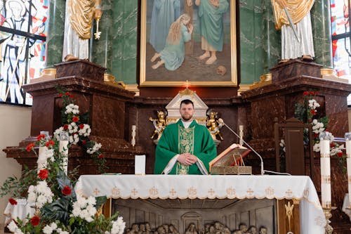 A Priest Standing in the Altar