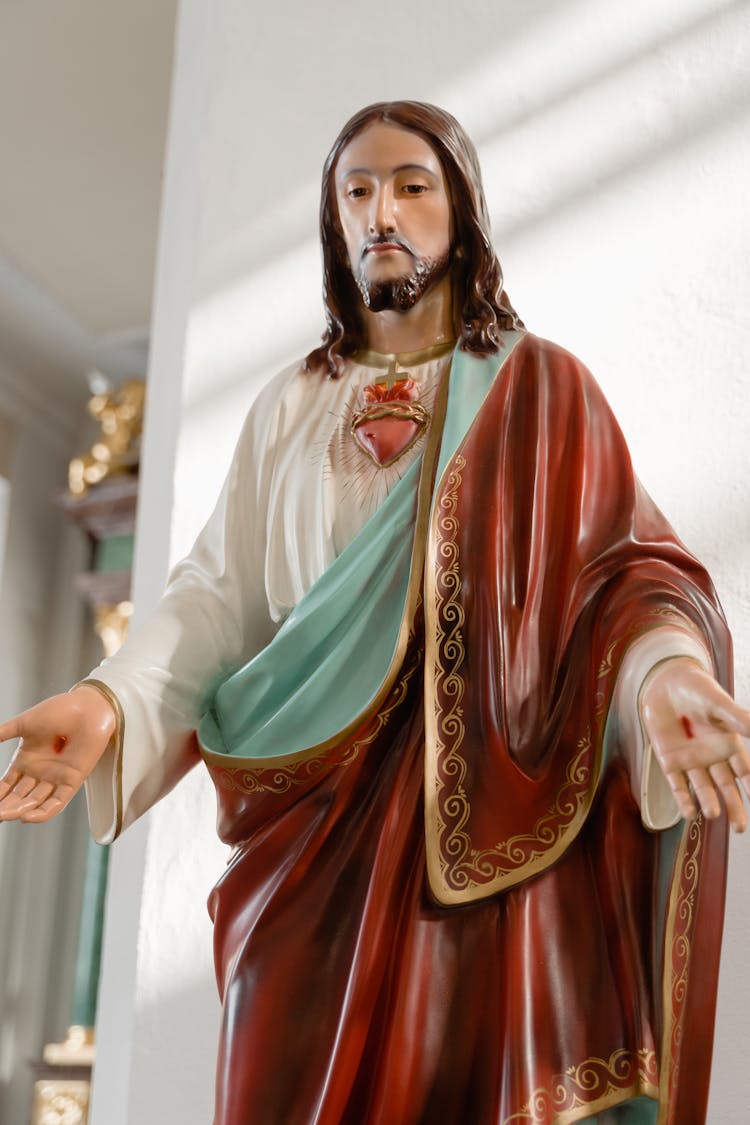 A Statue Of The Sacred Heart Of Jesus