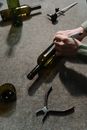 A Person Cutting a Wine Glass