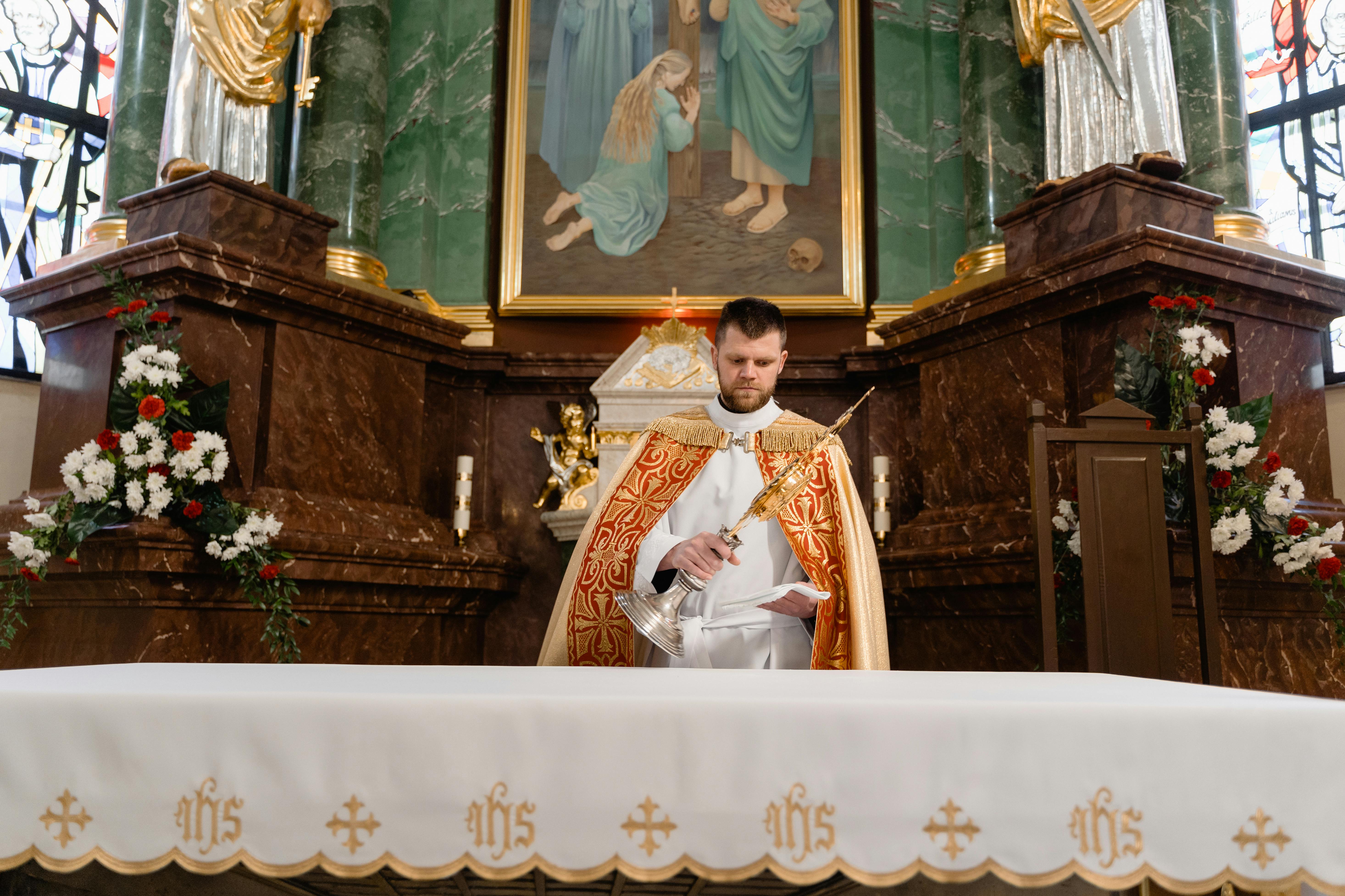 a priest at the altar