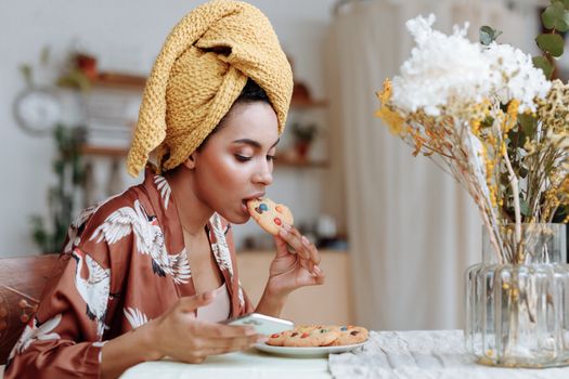 Girl in Yellow Knit Cap Eating