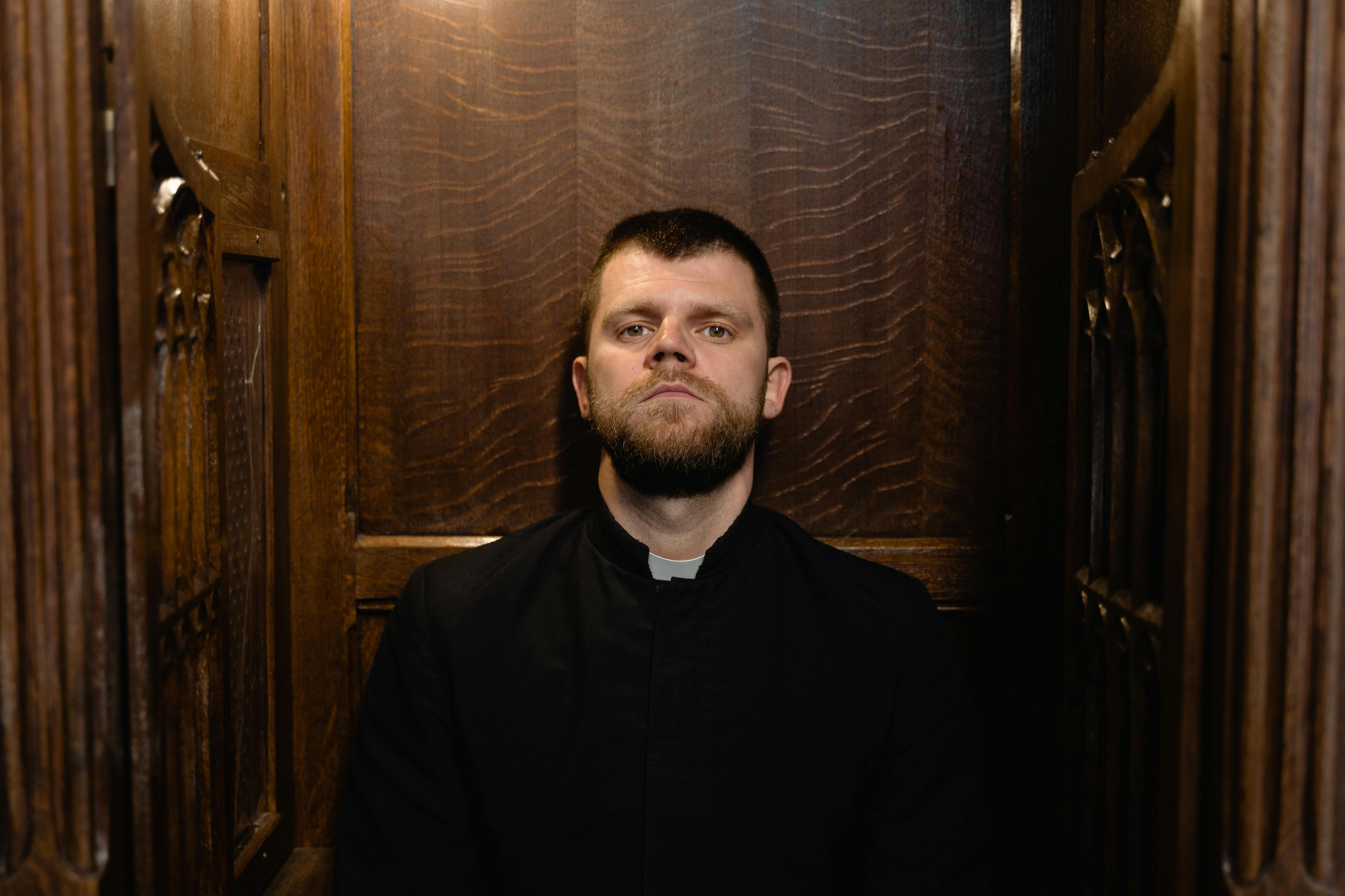 https://www.pexels.com/photo/photo-of-a-priest-in-a-confessional-7220103/