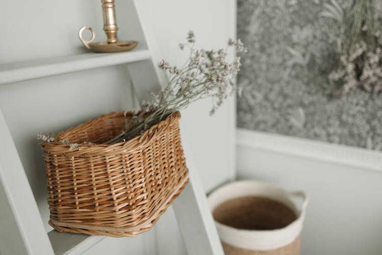 
A Baby's Breath Flower In A Woven Basket