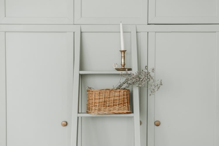 

A Baby's Breath Flower In A Woven Basket