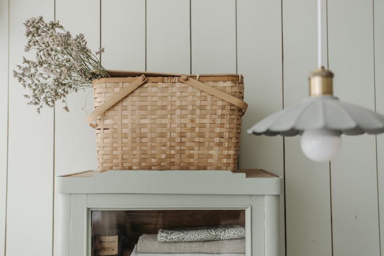 
A Baby's Breath Flower In A Woven Basket