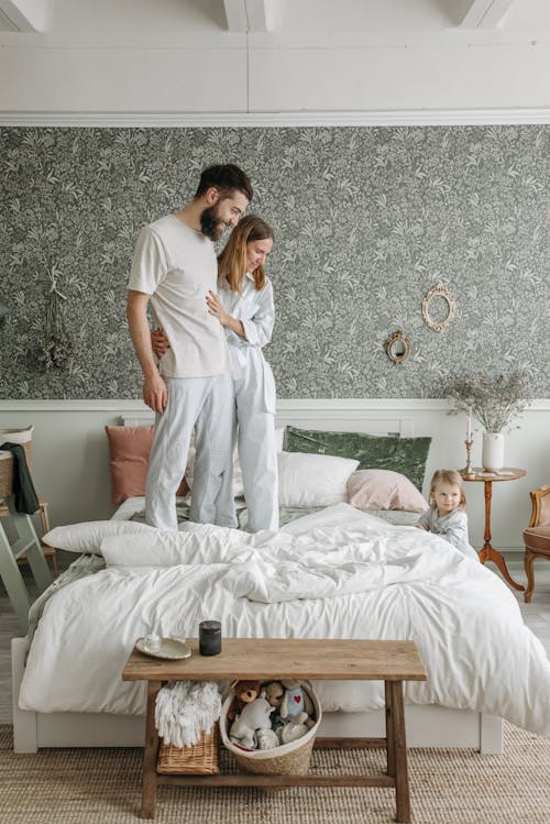 Happy Family in the Bedroom