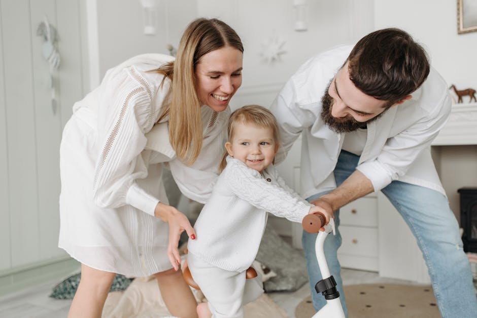 family with young child playing happily on clean carpet - carpet cleaning Grove City family with young child playing happily on clean carpet - carpet cleaning Grove City