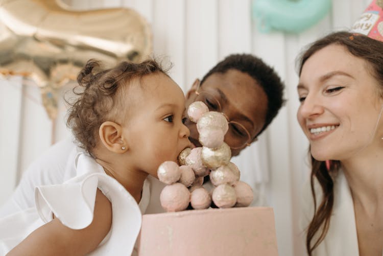 Baby Eating The Ball On The Cake 