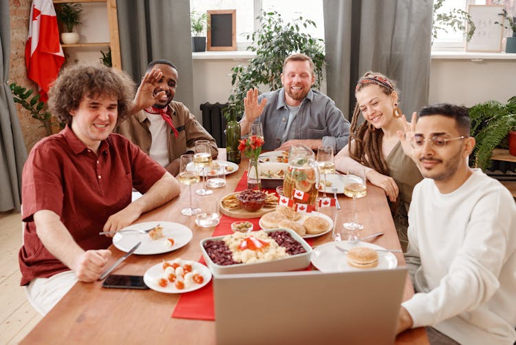 Family On A Video Call During Dinner