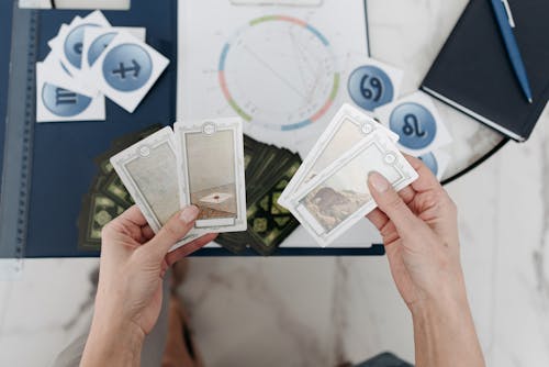 Woman Holding Tarot Cards 