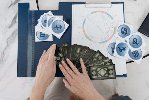 Woman Spreading Cards for a Tarot Reading