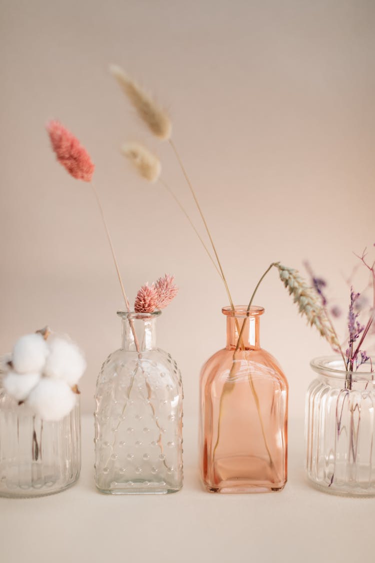 Dry Flowers In Glass Bottles