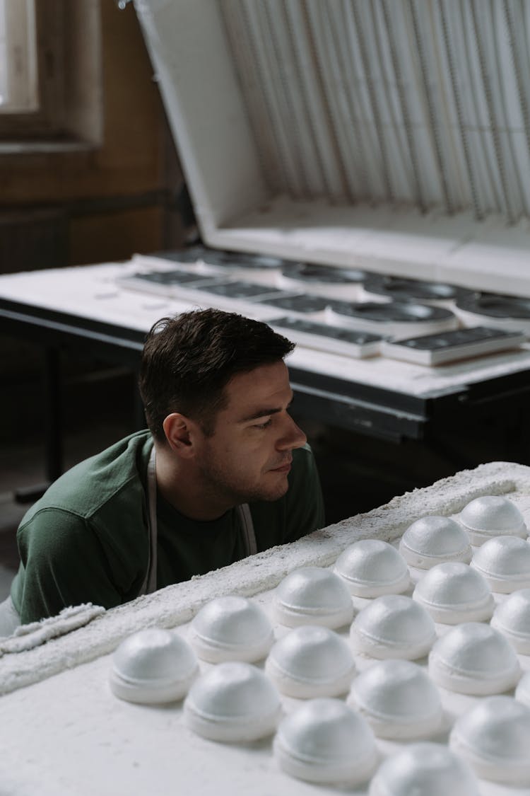 A Man Making Ceramic Bowls