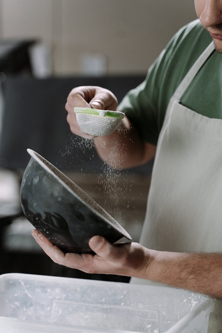 A Man Making Ceramic Bowls