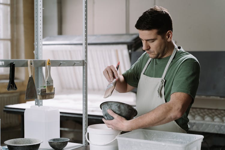 A Man Making A Ceramic Bowl