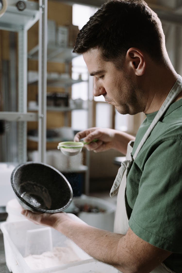 A Man Making Ceramic Bowls