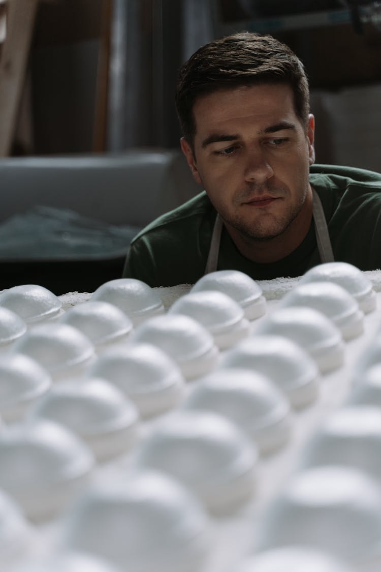 A Man Making Ceramic Bowls