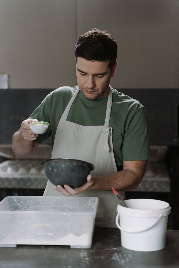 A Man Making Ceramic Bowls