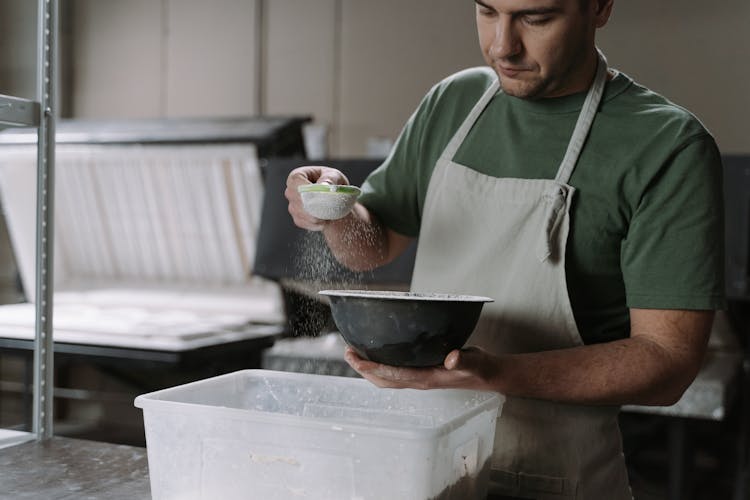 A Man Making Ceramic Bowls