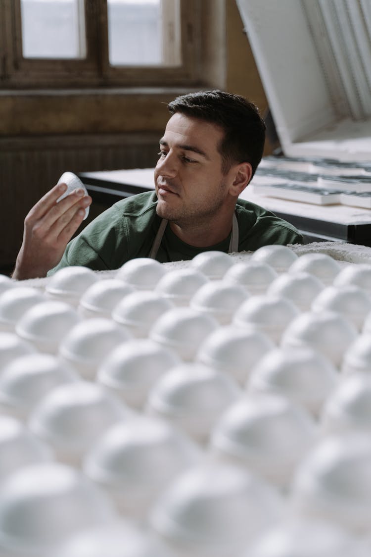 A Man Manufacturing Ceramic Bowls