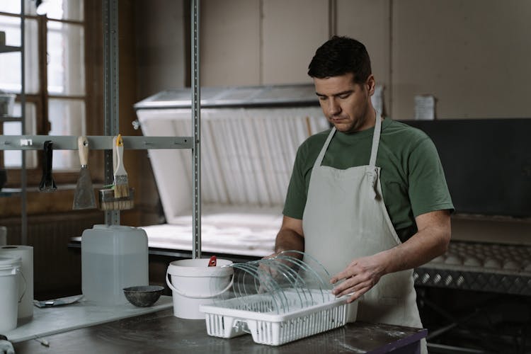 A Man Making Ceramic Bowls