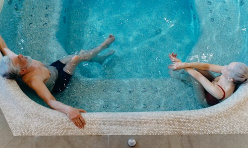 Photo of an Elderly Couple in a Swimming Pool