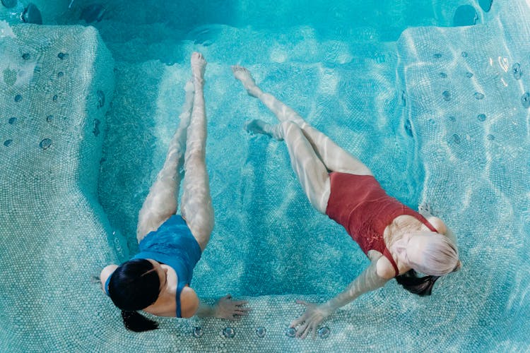 Overhead Shot Of Women Wearing Swimsuits