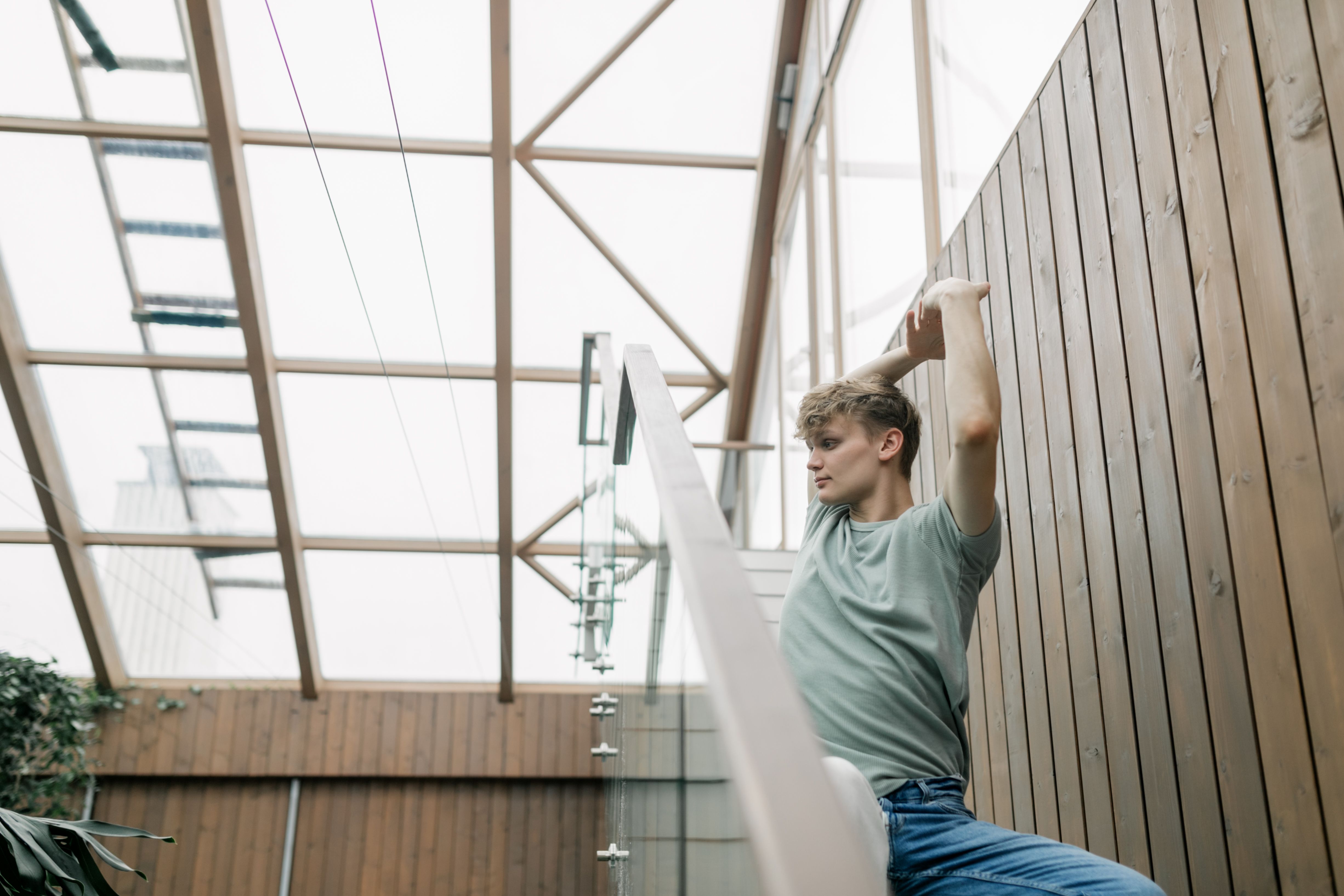 Man Posing on the Side of the Stairs · Free Stock Photo