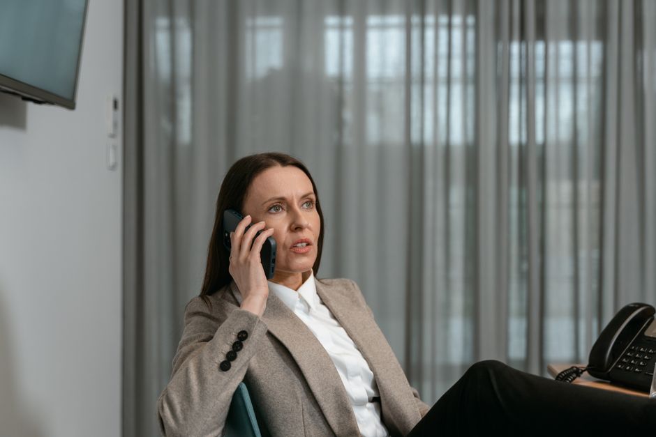 professional woman expressing milk discreetly office environment