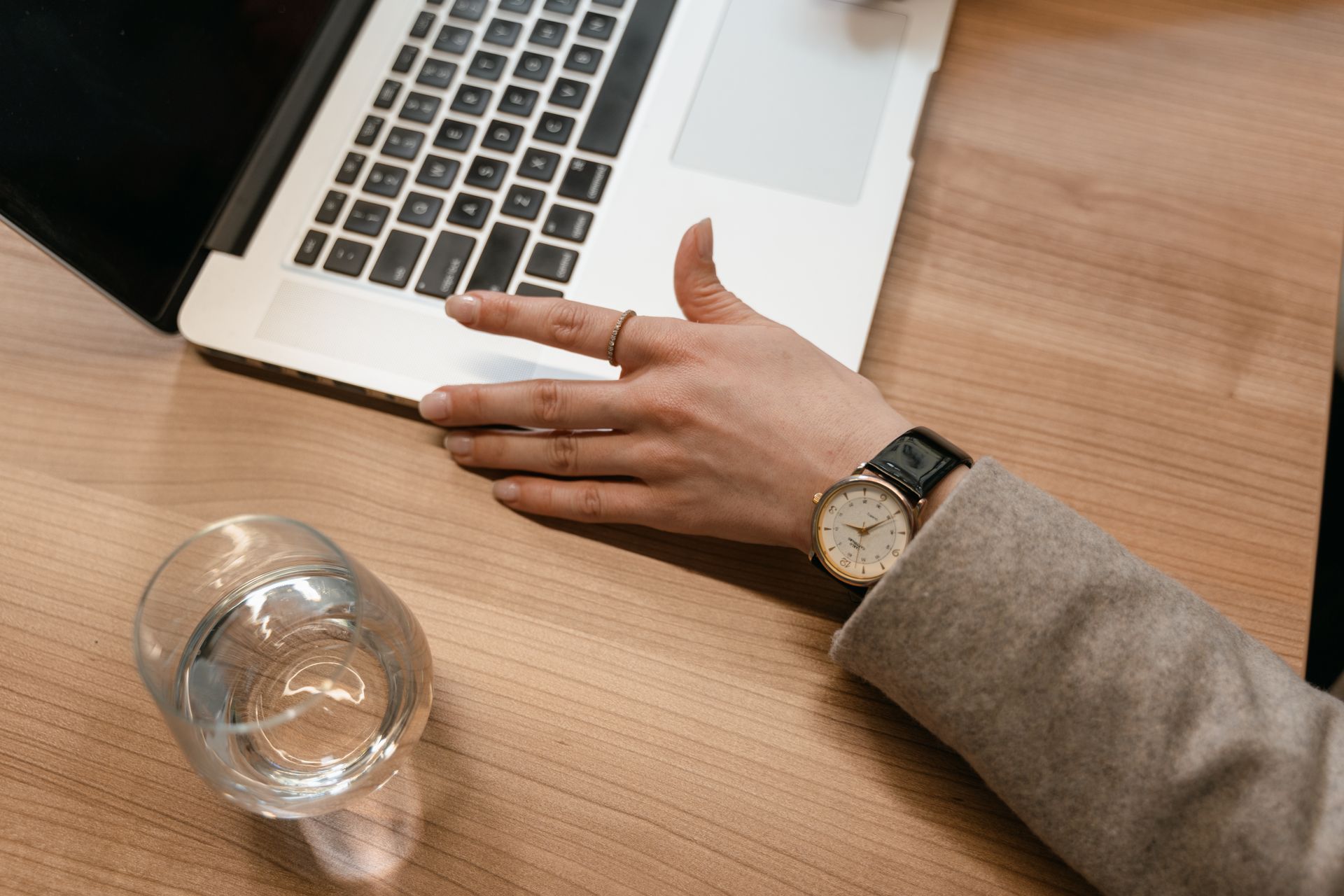 Person Wearing Gold and Silver Analog Watch