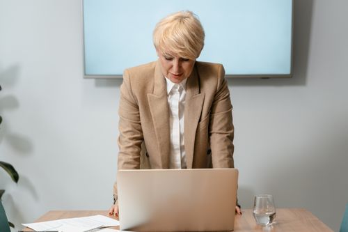 Photograph of a Woman Working on Her Laptop · Free Stock Photo