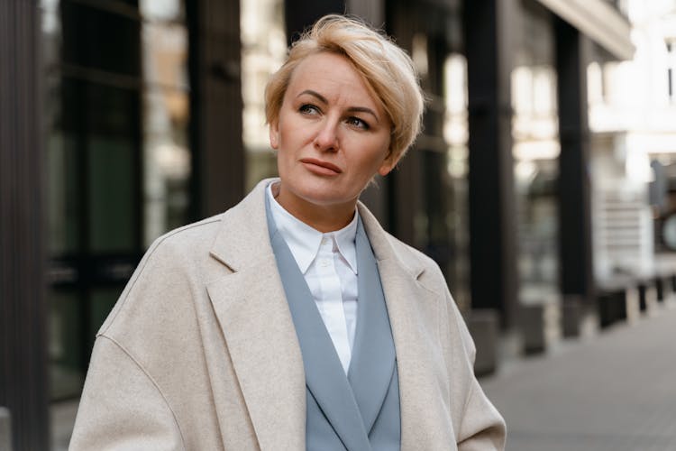 Portrait Of A Woman With Short Blond Hair