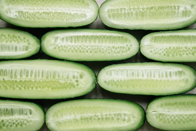 Close-up Of Cut Cucumbers In Lines