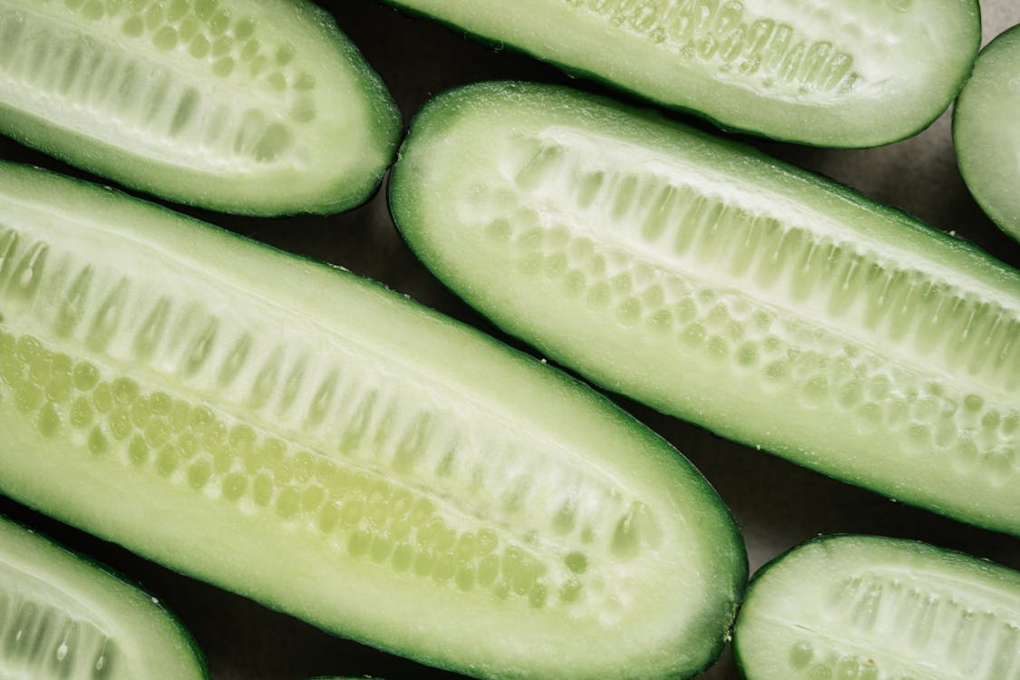 Free Green and White Sliced Cucumbers Stock Photo