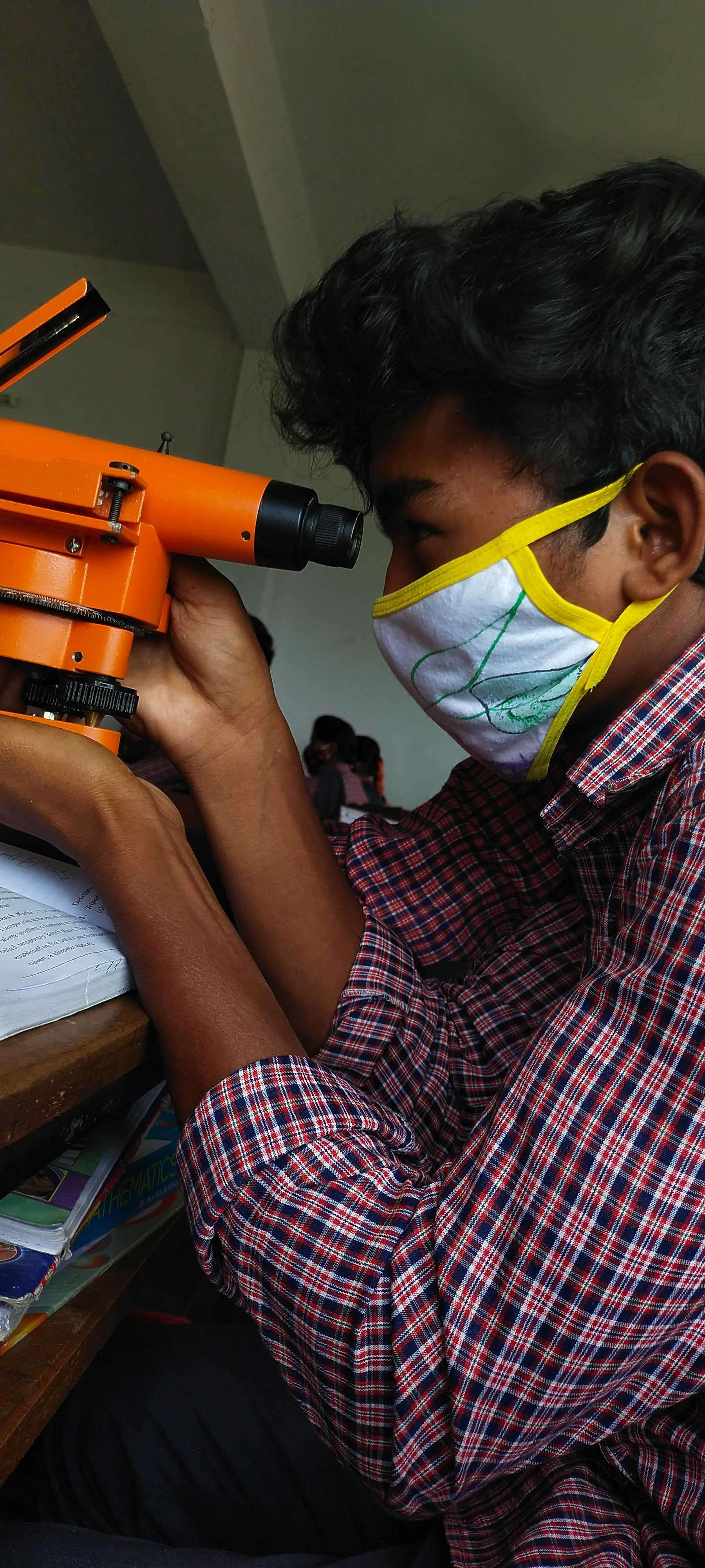 Spotlights shining over a wrestling ring before a show