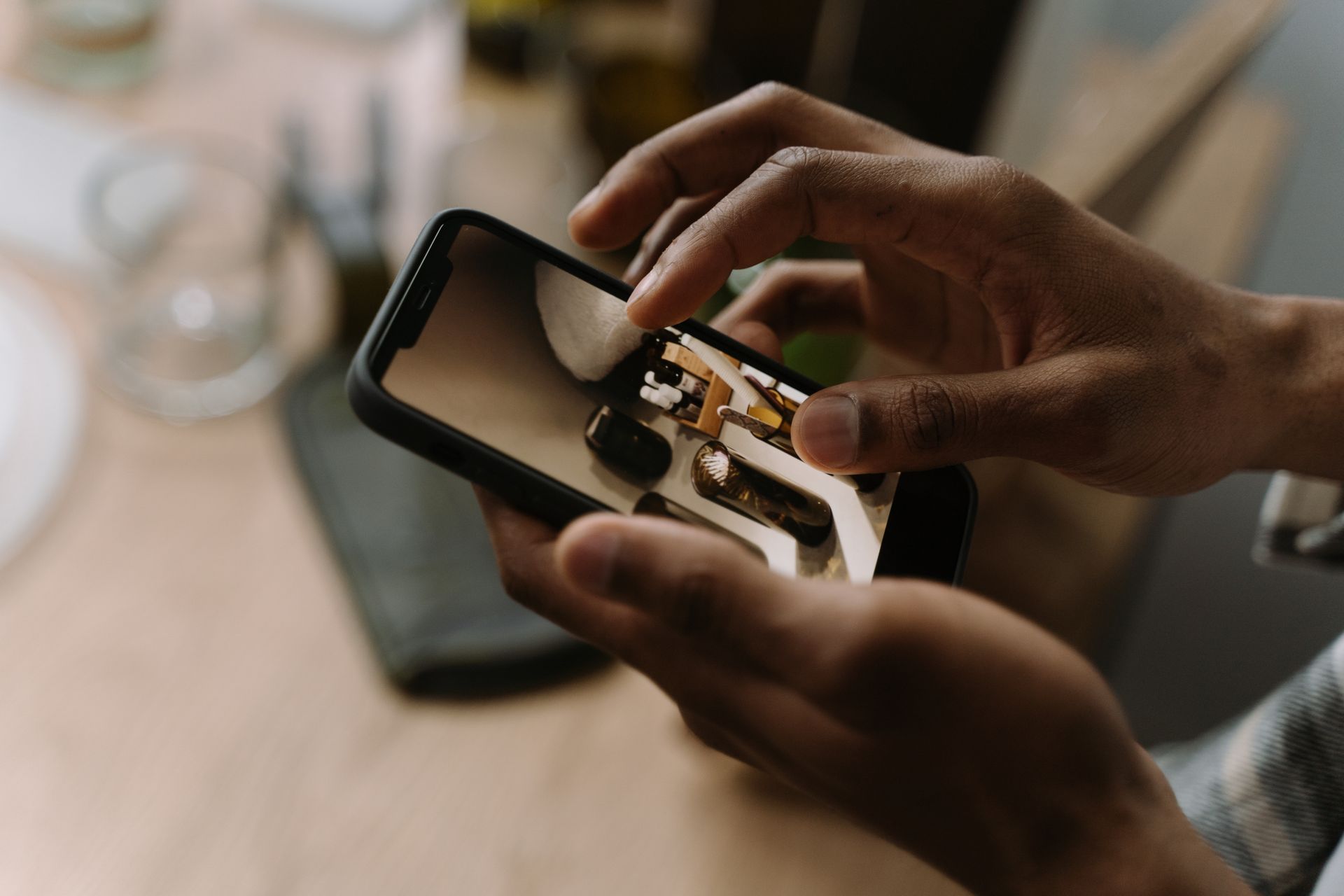 Close-Up Shot of a Person Holding a Smartphone
