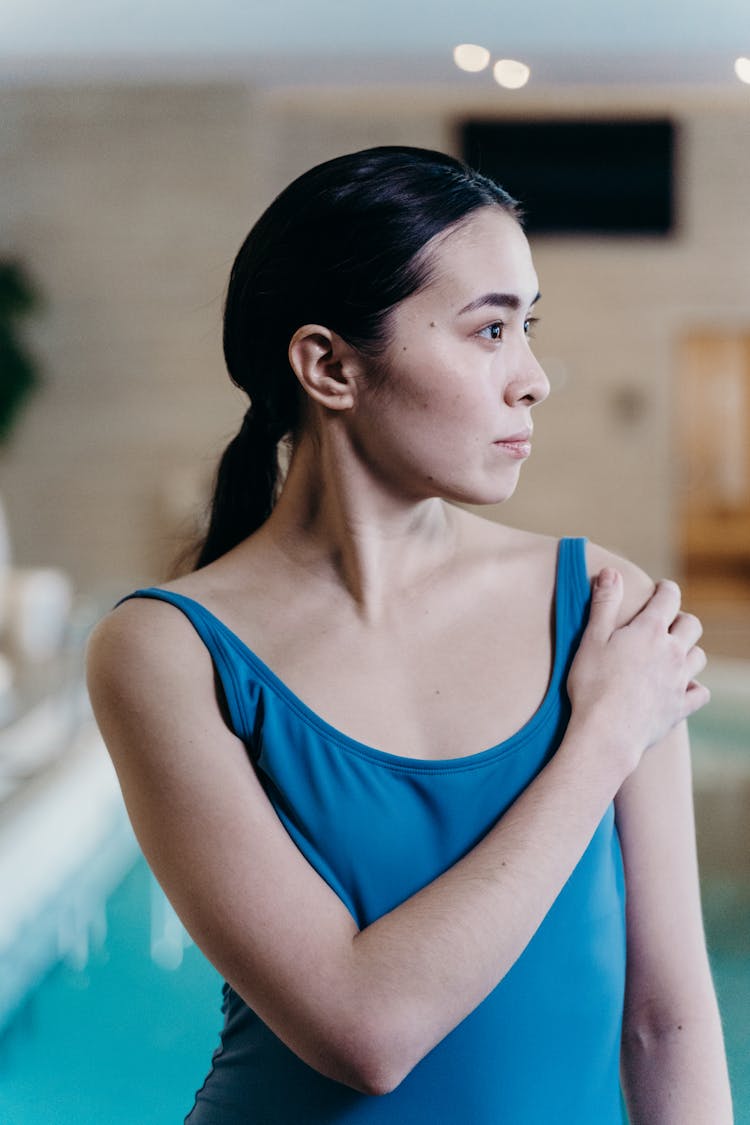 A Woman In Blue Swim Suit